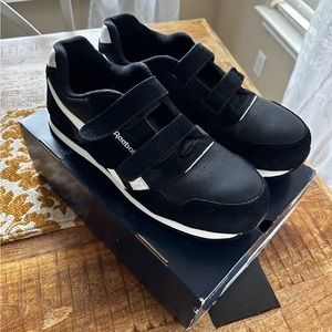 Pair of Leather Reebok work shoes for men. size 14 and I wore them once